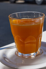 glass of orange juice in imperia italy