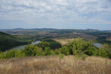 Naklejka premium landscape autumn view of the river and the village