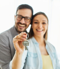 couple key house happy young home new investment pregnant mother pregnancy real estate apartment holding buying love belly maternity