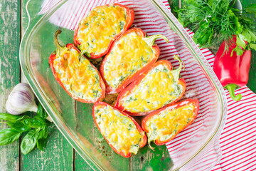 Stuffed bell pepper. Bell pepper with cottage cheese and herbs. Baked pepper stuffed with cottage...