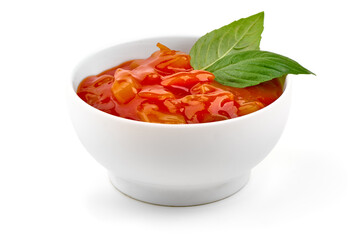 Hungarian lecho of tomatoes and sweet paprika, isolated on white background.