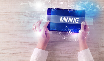 Close-up of a tablet searching inscription