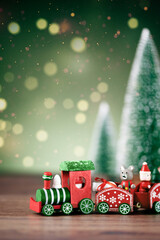 Red Christmas toy train. Christmas greeting card. Christmas background with copy space.