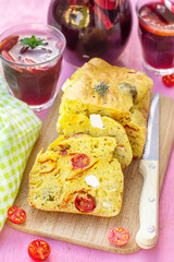 Savoury cake with curry, chorizo, cherry tomatoes, olives and feta - 531494663