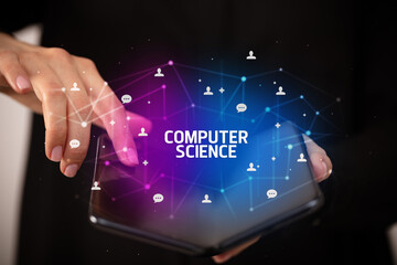 Businessman holding a foldable smartphone, new technology concept