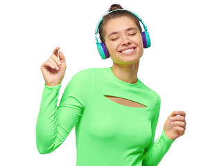Happy woman music lover in wireless headphones listening to popular music