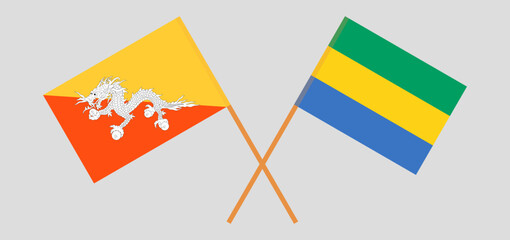 Crossed flags of Gabon and Bhutan. Official colors. Correct proportion
