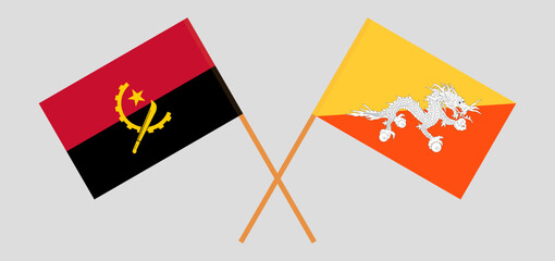 Crossed flags of Angola and Bhutan. Official colors. Correct proportion
