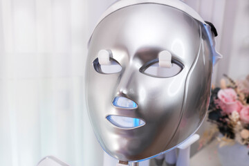 Skin rejuvenation led facial mask for beautiful healthy skin. Light therapy, anti age, beauty and skin care.