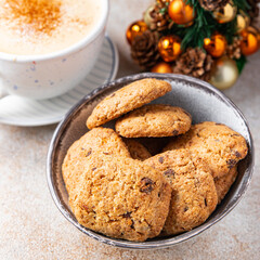 christmas cookie chocolate drops, cinnamon, ginger new year sweet dessert home holiday meal food snack on the table copy space food background