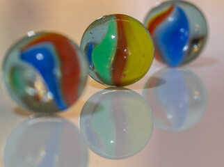 Colored marbles and their reflections
