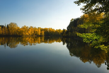 Russia. South of Western Siberia, Kuzbass. A windless sunny evening at the Pritomsky quarries of Novokuznetsk in the middle of autumn.