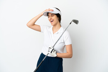Handsome young golfer player woman isolated on white background smiling a lot