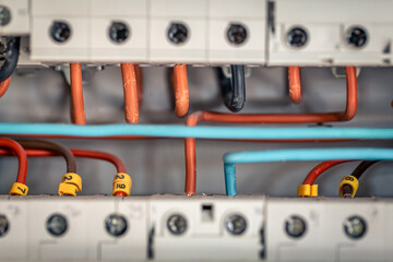 Electrical panel with fuses and contactors, close-up.