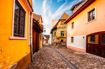Sighisoara, Transylvania, Romania with famous medieval fortified city and the Clock Tower built by Saxons. Turnul cu ceas - obrazy, fototapety, plakaty