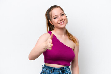 Young caucasian girl isolated on white background shaking hands for closing a good deal