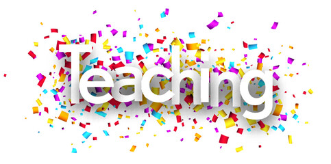 Teaching sign over colorful cut ribbon confetti background.
