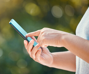 Hands, phone and woman in park searching social media, internet and news blog in nature, garden...