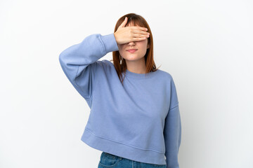 Redhead girl isolated on white background covering eyes by hands. Do not want to see something