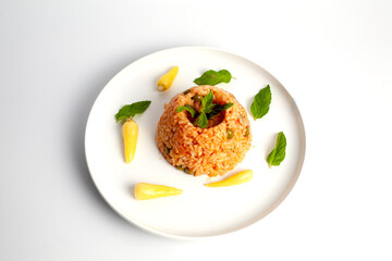 rice pilaf with sauce and ornamental pepper