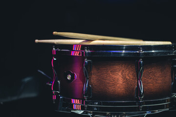 Close-up, snare drum on a dark background isolated, copy space.