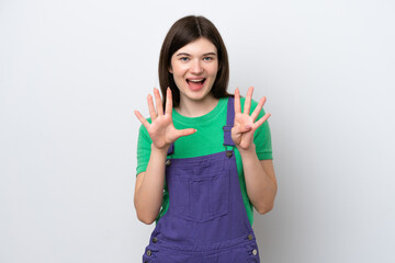 Young Russian woman isolated on blue background counting nine with fingers