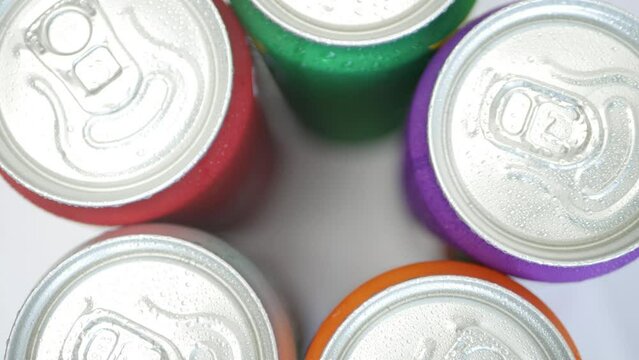 Various Cold, Sweet, and Carbonated Refreshing Drinks. Shooting with Refreshing Pop Can Drinks.