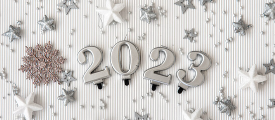Christmas background with numbers 2023 on a white background.