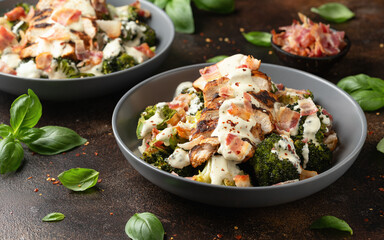 Baked chicken, broccoli with creamy cheese sauce and bacon