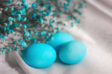 Close-up of beautiful blue Easter eggs. Easter decor. Selective focus