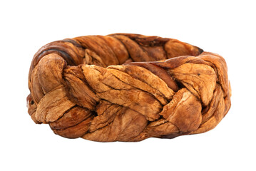 Dried melon in the shape of a pigtail on a white background. Dried melon fruit isolate