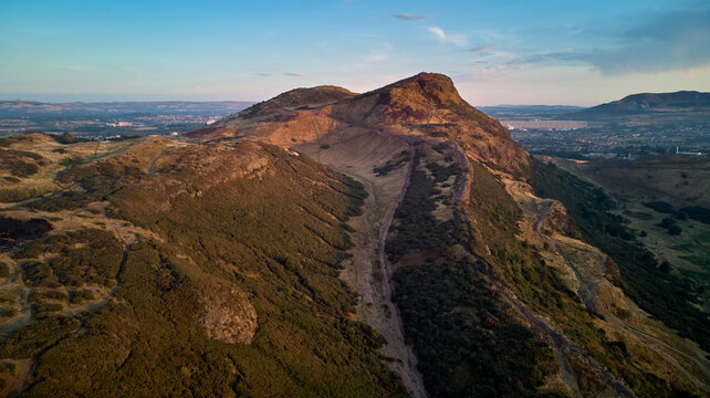 Arthur's Seat from above at summer evening - flying drone over Edinburgh