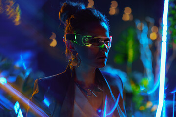 Silhouette of modern 40 years old business woman in metaverse