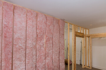 The installation of mineral fiber glass wool as an interior thermal and sound insulation is...