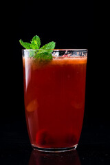 Fruit hot tea with the addition of oranges and raspberries in a glass cups Healthy hot drink