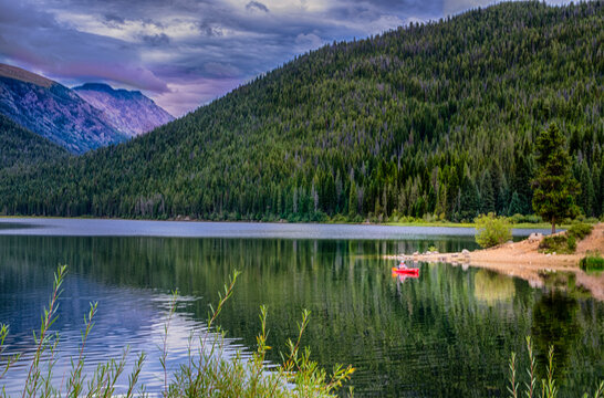 Kayak floating on Monarch Lake near Granby Colorado
