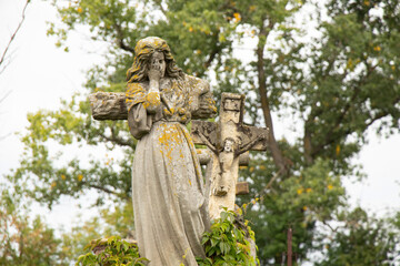 Old cemetery of Polish Jews in Ukraine. Ancient abandoned graves. Cemetery sculpture of the 18th and 19th centuries,Cemetery in Ukraine 2022