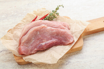 Raw pork schnitzel for roast