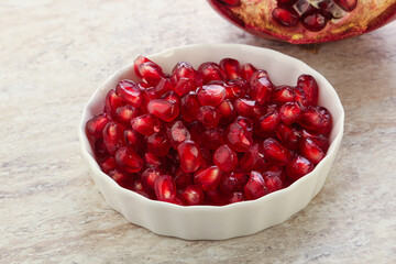Ripe red Pomegranate seeds in the bowl
