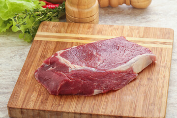 Raw rib-eye beef steak black angus