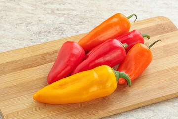 Ripe juicy baby bell peppers heap