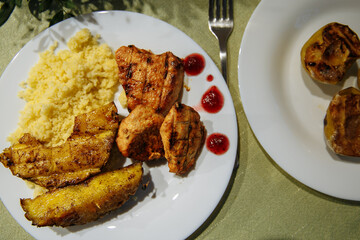 ready food on the table in plates with flowers on the festive table