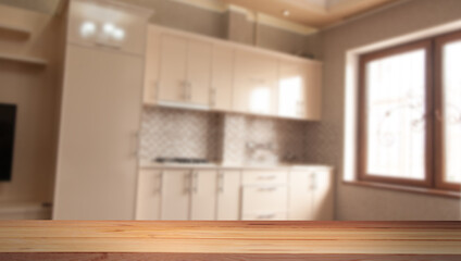 Wooden table with color bokeh background.