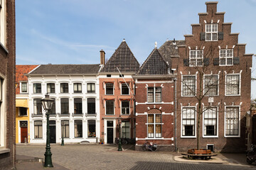Cozy small street with historic houses in the center of the Dutch student city Leiden.