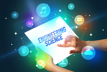 Holding futuristic tablet, new media concept