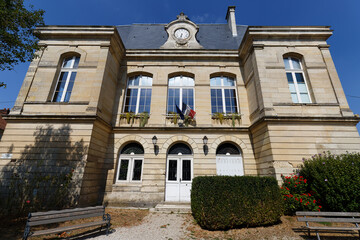 The Pierrefonds Town Hall with its clock and the warning siren on the roof. France.