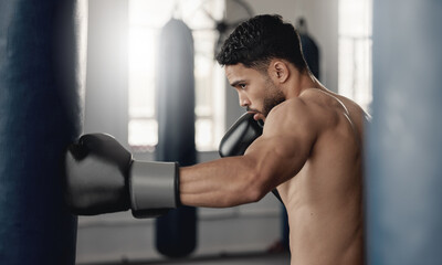 Training, fitness and workout man boxer, sweating and doing a cardio exercise at the gym. Sporty,...