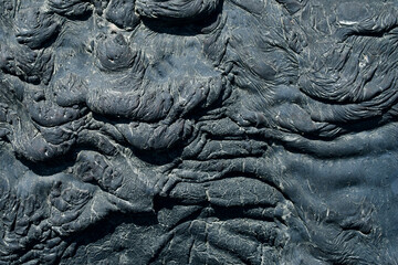 Oil tar frozen in waves, texture black rough background - obrazy, fototapety, plakaty