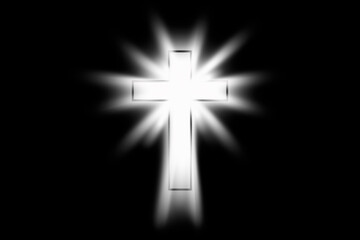 Glowing cross on a black background.