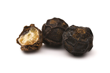 Closeup of black peppercorns